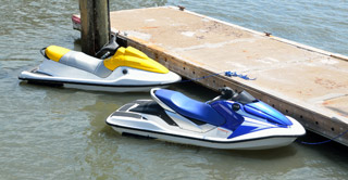 Jet Skis Tied to Dock